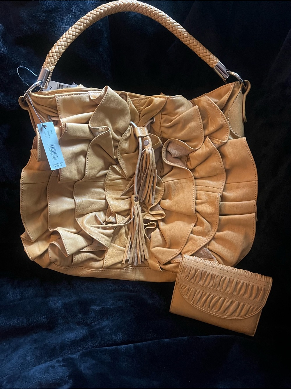 Anya Tan Ruffle Tote Bag with Tassel Accent and wallet.